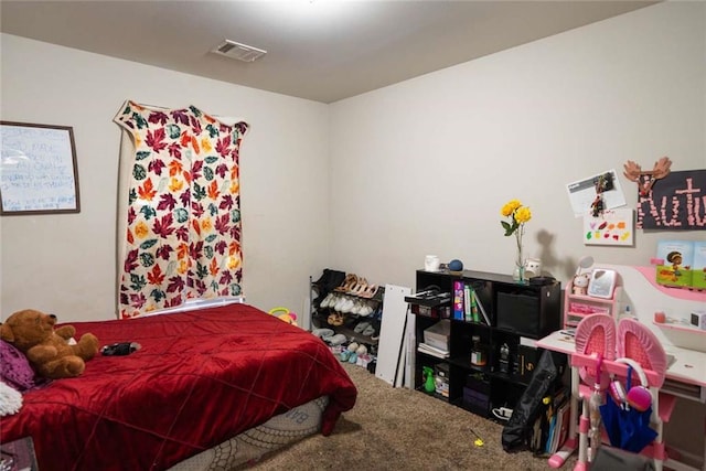 bedroom with visible vents and carpet