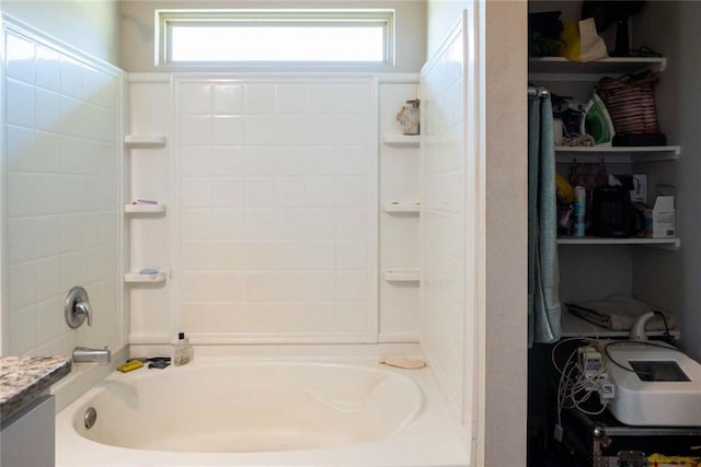 full bath with vanity and shower / washtub combination