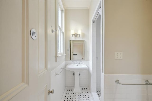 full bathroom featuring tile patterned floors and a shower