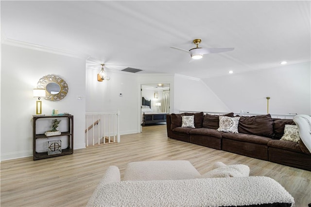 1612 Marina Dr, Slidell, LA 70458 - living area with ornamental molding, visible vents, ceiling fan, and light wood-type flooring