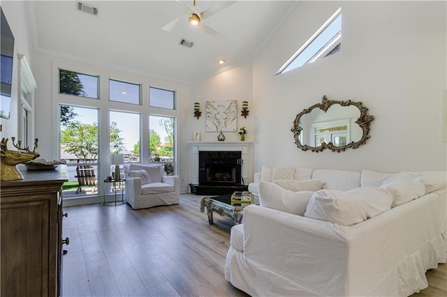 1612 Marina Dr, Slidell, LA 70458 - living area with high vaulted ceiling, visible vents, ornamental molding, and ceiling fan
