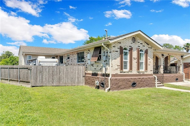 5245 Sanford St, Metairie, LA 70006 - view of front of house featuring brick siding and covered porch