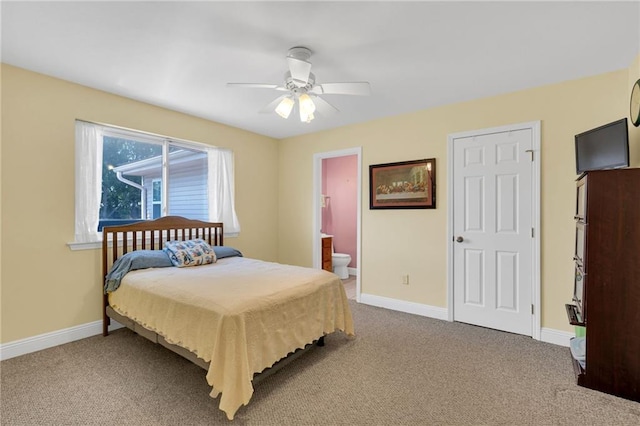5245 Sanford St, Metairie, LA 70006 - carpeted bedroom with baseboards, ceiling fan, and connected bathroom
