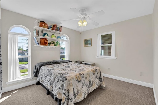5245 Sanford St, Metairie, LA 70006 - bedroom with carpet flooring, multiple windows, and baseboards