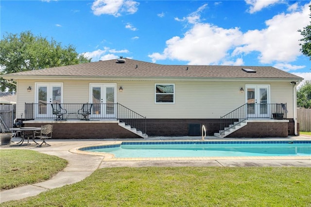 5245 Sanford St, Metairie, LA 70006 - rear view of property with french doors, stairs, an outdoor pool, and a patio