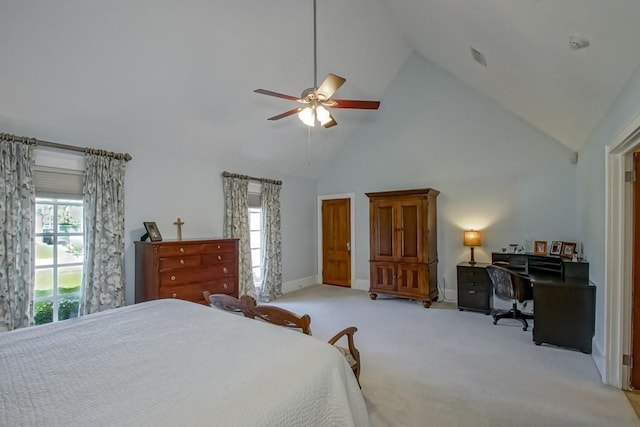 bedroom with ceiling fan, light carpet, baseboards, and high vaulted ceiling