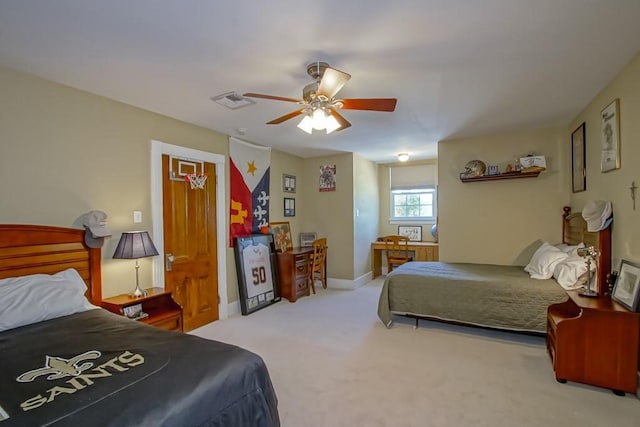 bedroom with visible vents, baseboards, a ceiling fan, and carpet floors