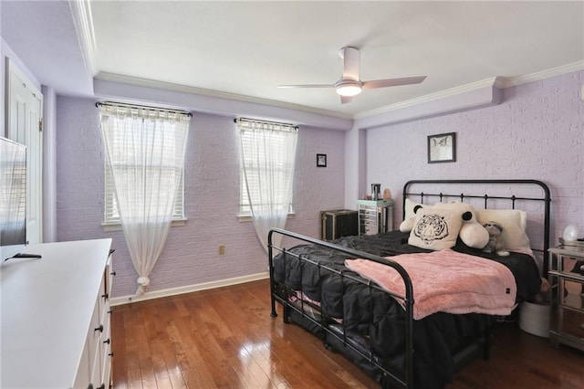 3915 St Charles Ave Unit 215, New Orleans, LA 70118 - bedroom featuring hardwood / wood-style flooring, ornamental molding, baseboards, and a ceiling fan