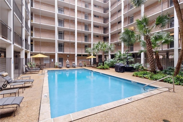3915 St Charles Ave Unit 215, New Orleans, LA 70118 - community pool with a patio