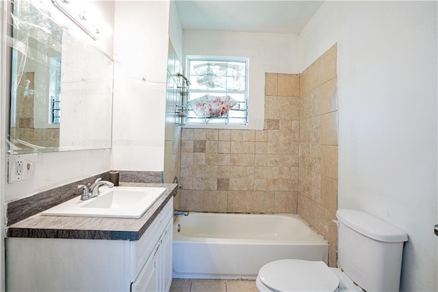 full bath featuring shower / bath combination, vanity, tile patterned floors, and toilet