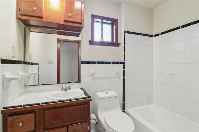 2617 Danneel St, New Orleans, LA 70113 - full bath with toilet, vanity, and a textured wall