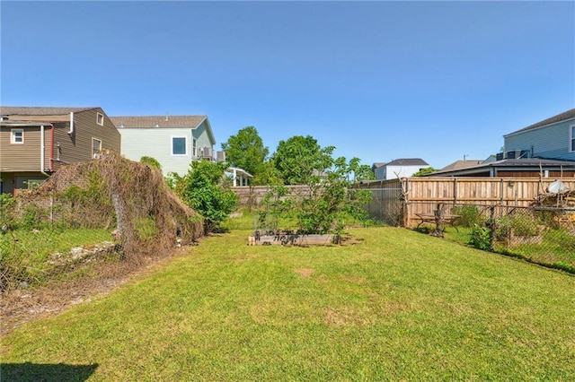 2617 Danneel St, New Orleans, LA 70113 - view of yard featuring a garden and fence