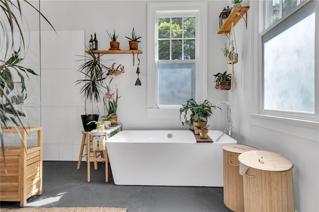 full bathroom featuring a soaking tub