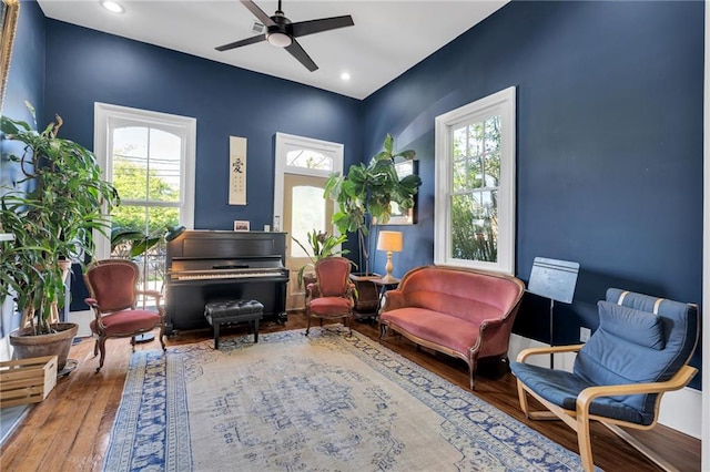 sitting room featuring recessed lighting, a ceiling fan, and wood finished floors