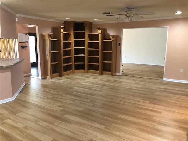711 Roseland Pkwy, Harahan, LA 70123 - unfurnished living room with ceiling fan, ornamental molding, wood finished floors, baseboards, and recessed lighting