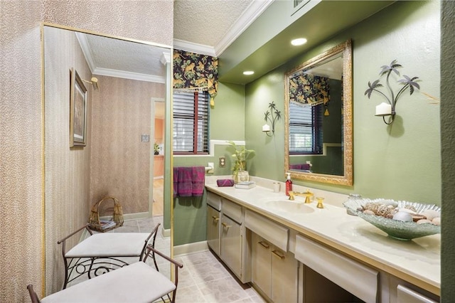 bathroom with a textured ceiling, visible vents, tile patterned flooring, crown molding, and vanity