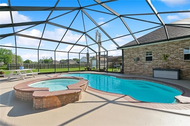155 Maud Olive Dr, Belle Chasse, LA 70037 - view of swimming pool with a patio area, fence, a pool with connected hot tub, and glass enclosure
