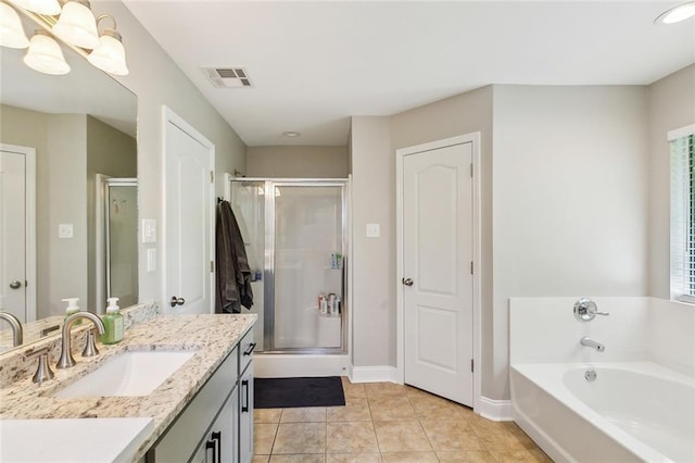 309 Allie Ln, Luling, LA 70070 - bathroom featuring a stall shower, vanity, tile patterned flooring, and visible vents
