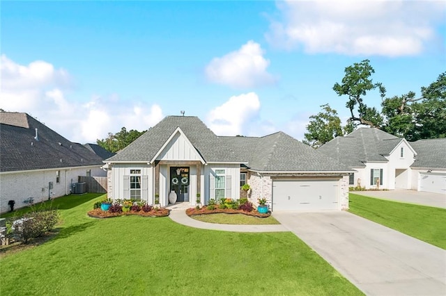 view of front of property with central AC unit, an attached garage, board and batten siding, driveway, and a front yard