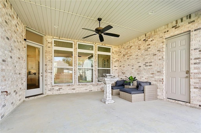 view of patio / terrace featuring ceiling fan