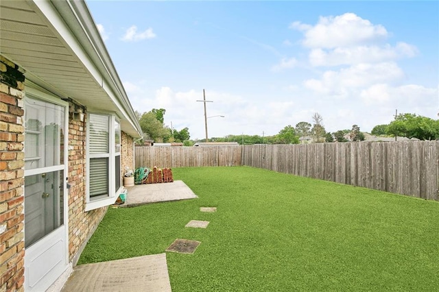 6505 Carmen St, Metairie, LA 70003 - view of yard with a patio area and a fenced backyard