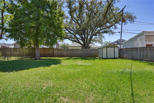 10012 Joel Ave, River Ridge, LA 70123 - view of yard featuring an outbuilding, a fenced backyard, and a storage unit
