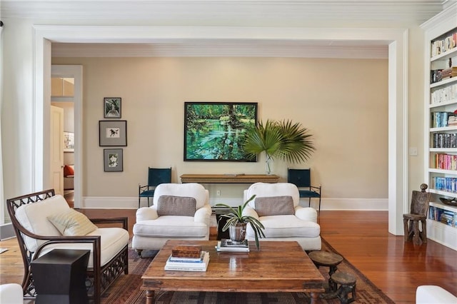 3611 Carondelet St, New Orleans, LA 70115 - living room featuring baseboards, built in features, wood finished floors, and ornamental molding