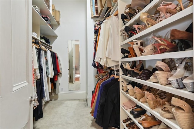 3611 Carondelet St, New Orleans, LA 70115 - walk in closet featuring carpet flooring
