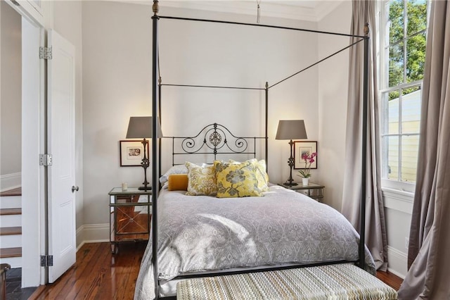 3611 Carondelet St, New Orleans, LA 70115 - bedroom featuring baseboards, ornamental molding, and hardwood / wood-style flooring