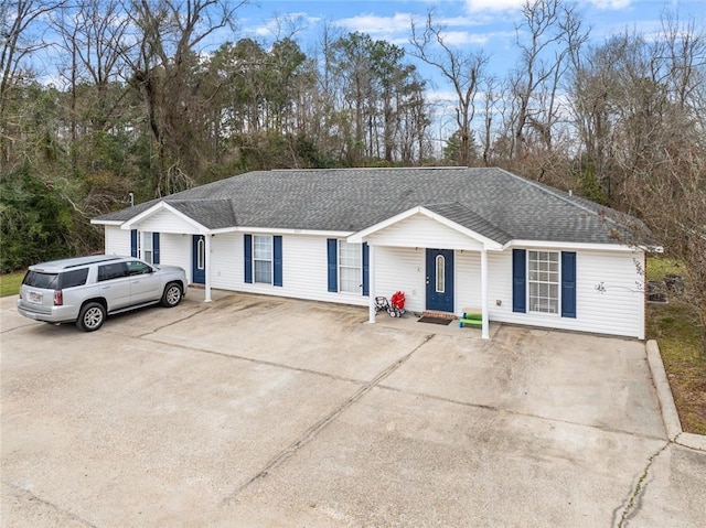 48351 Woodhaven Rd, Tickfaw, LA 70466 - single story home with a shingled roof and driveway
