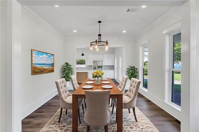 dining area with an inviting chandelier, baseboards, visible vents, and recessed lighting