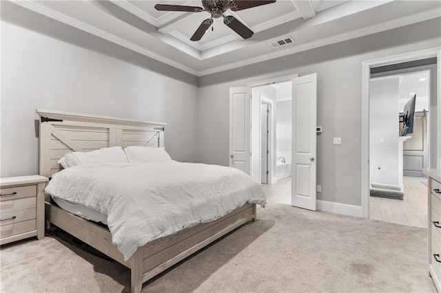 bedroom featuring crown molding, ensuite bath, light carpet, and visible vents