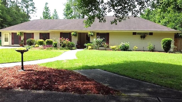 232 Chateau Dr, Slidell, LA 70460 - single story home featuring a front yard