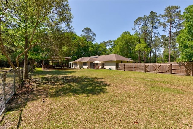 232 Chateau Dr, Slidell, LA 70460 - fenced backyard featuring a gazebo