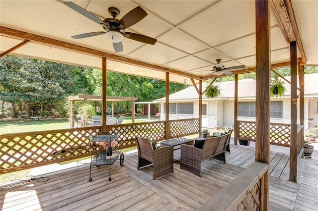 232 Chateau Dr, Slidell, LA 70460 - wooden terrace featuring ceiling fan and outdoor dining area