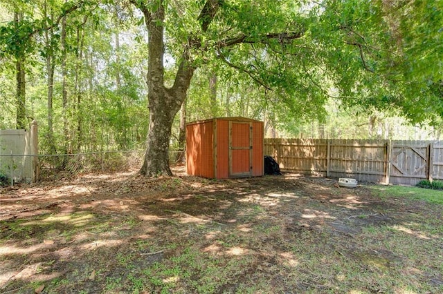 232 Chateau Dr, Slidell, LA 70460 - fenced backyard with a storage shed