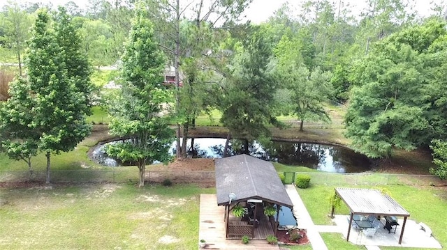 232 Chateau Dr, Slidell, LA 70460 - view of yard with a gazebo and a deck with water view