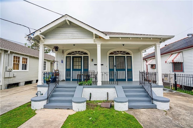 8632 Apple St, New Orleans, LA 70118 - shotgun-style home with covered porch