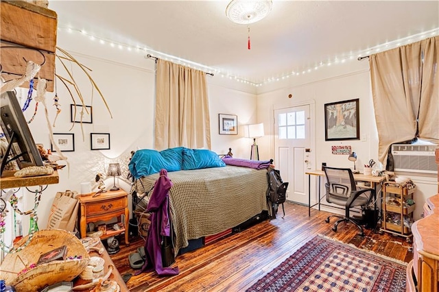 8632 Apple St, New Orleans, LA 70118 - bedroom featuring wood-type flooring