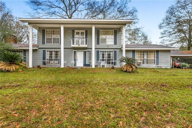1805 13th Ave, Franklinton, LA 70438 - rear view of property featuring a yard, a balcony, and covered porch