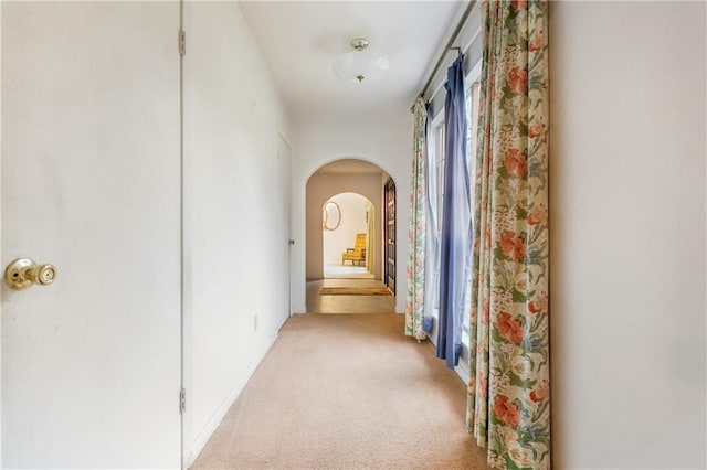 1805 13th Ave, Franklinton, LA 70438 - hall featuring arched walkways and light colored carpet