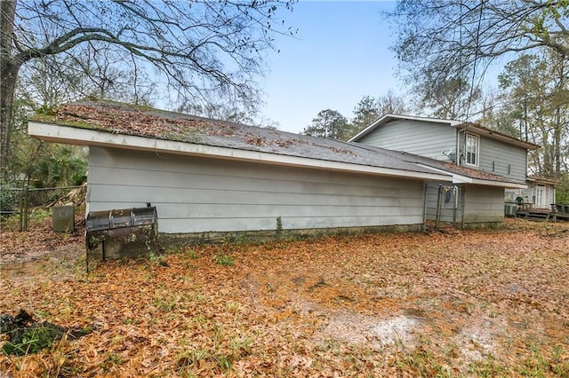 1805 13th Ave, Franklinton, LA 70438 - view of side of home featuring fence