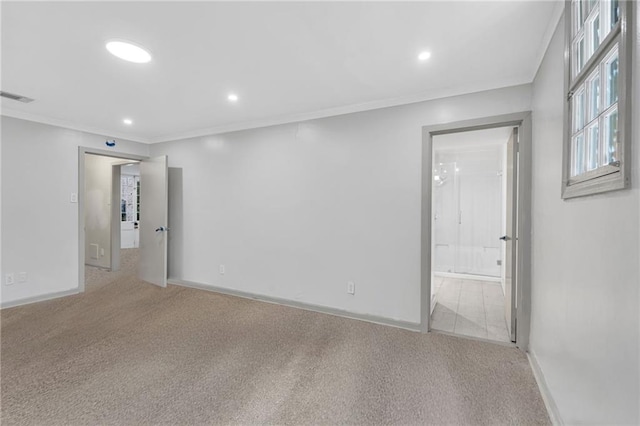818 Bourbon St Unit 1C, New Orleans, LA 70116 - unfurnished room with crown molding, baseboards, carpet floors, and recessed lighting
