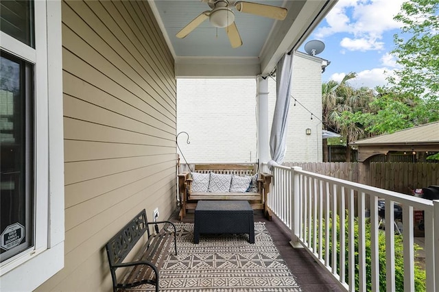 6038 Orleans Ave, New Orleans, LA 70124 - balcony featuring a ceiling fan