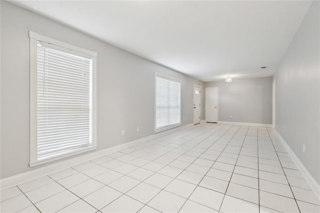 3832 Sue Ker Dr, Harvey, LA 70058 - unfurnished room with baseboards and light tile patterned flooring