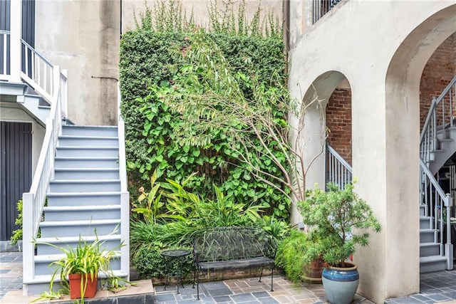 entrance to property featuring a patio