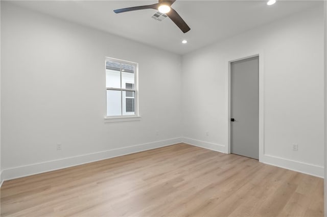 empty room featuring visible vents, baseboards, ceiling fan, recessed lighting, and light wood finished floors