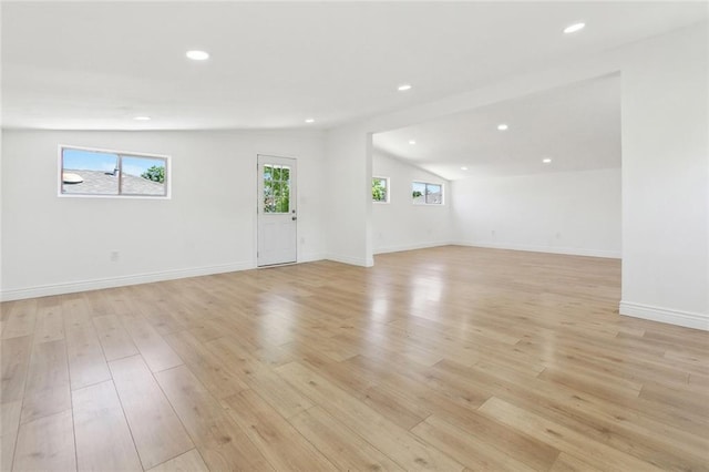empty room with recessed lighting and light wood-style floors