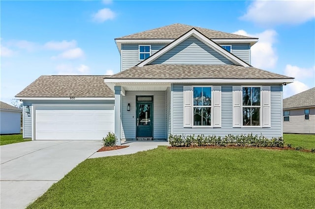 view of front of property featuring a front yard, an attached garage, a shingled roof, and driveway