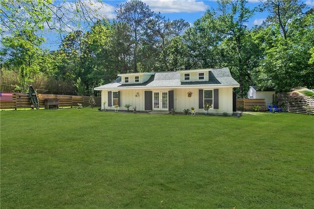 72315 Kustenmacher Rd, Abita Springs, LA 70420 - view of front of home featuring french doors, view of wooded area, and board and batten siding